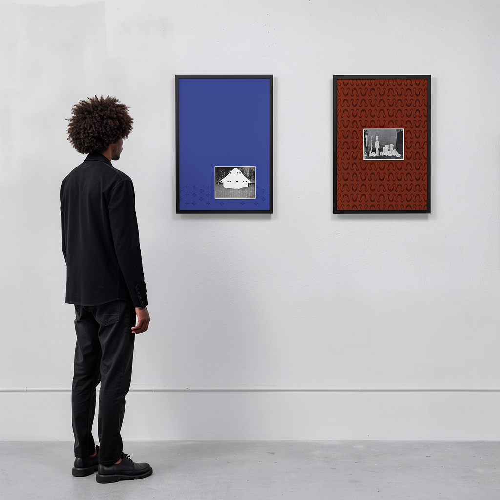 A visitor before the two framed works, one blue and one red, on the gallery wall