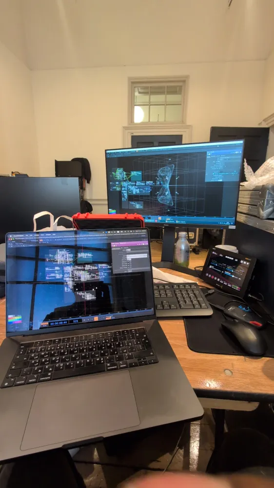 The studio rig — patch on one screen, wireframe on the other, recorder alongside