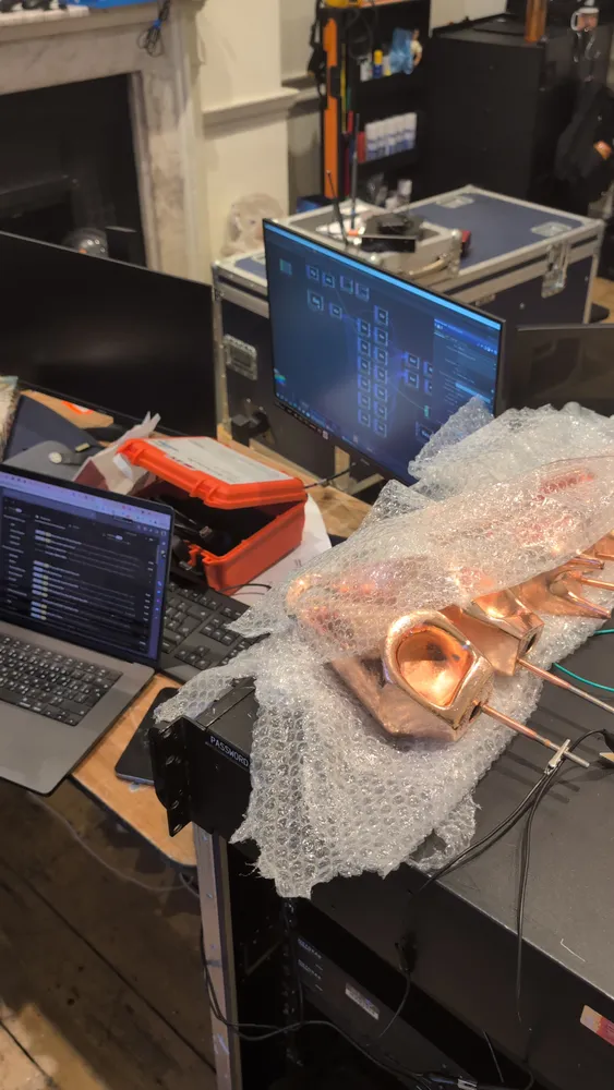 Copper components in bubble wrap on the bench, wired and ready
